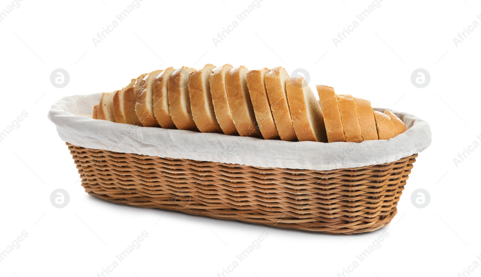 Photo of Sliced tasty fresh bread in wicker basket on white background