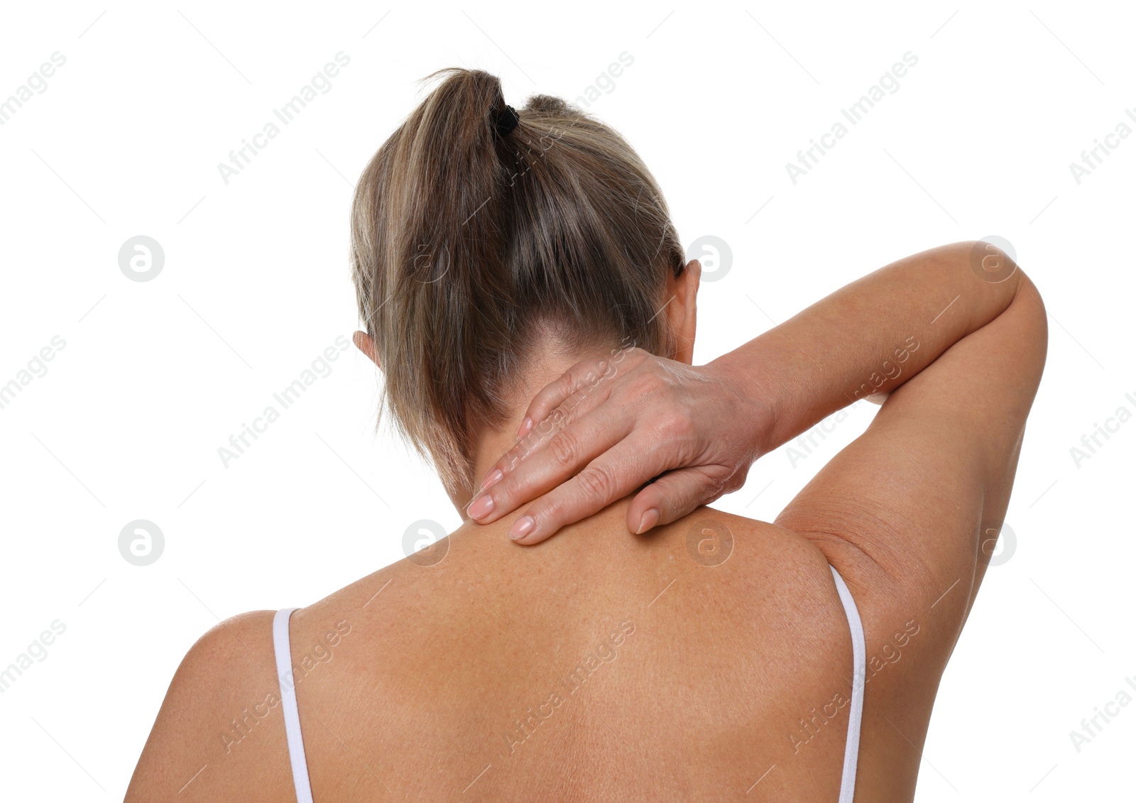 Photo of Woman suffering from pain in her neck on white background, back view