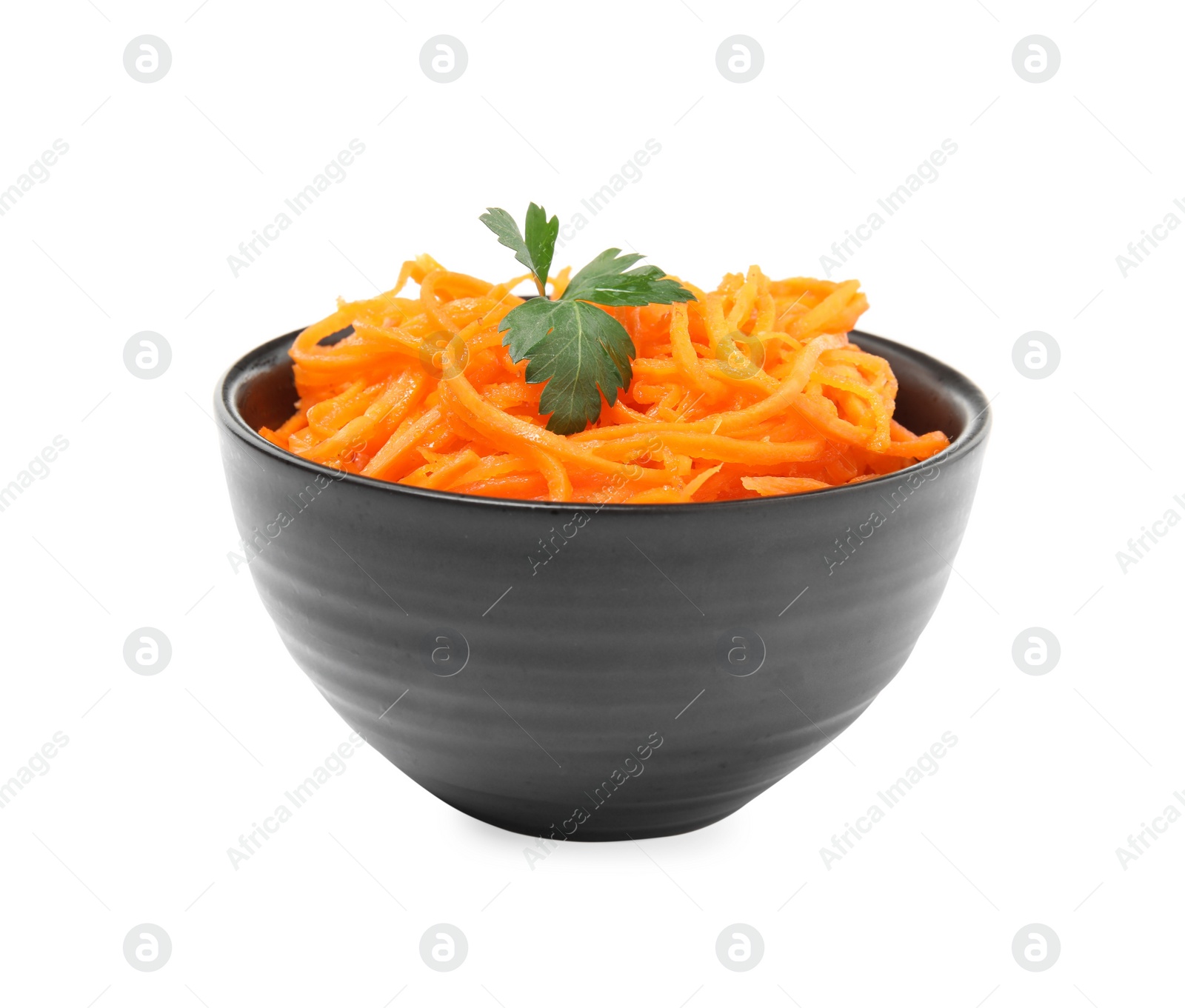 Photo of Delicious Korean carrot salad with parsley in bowl isolated on white