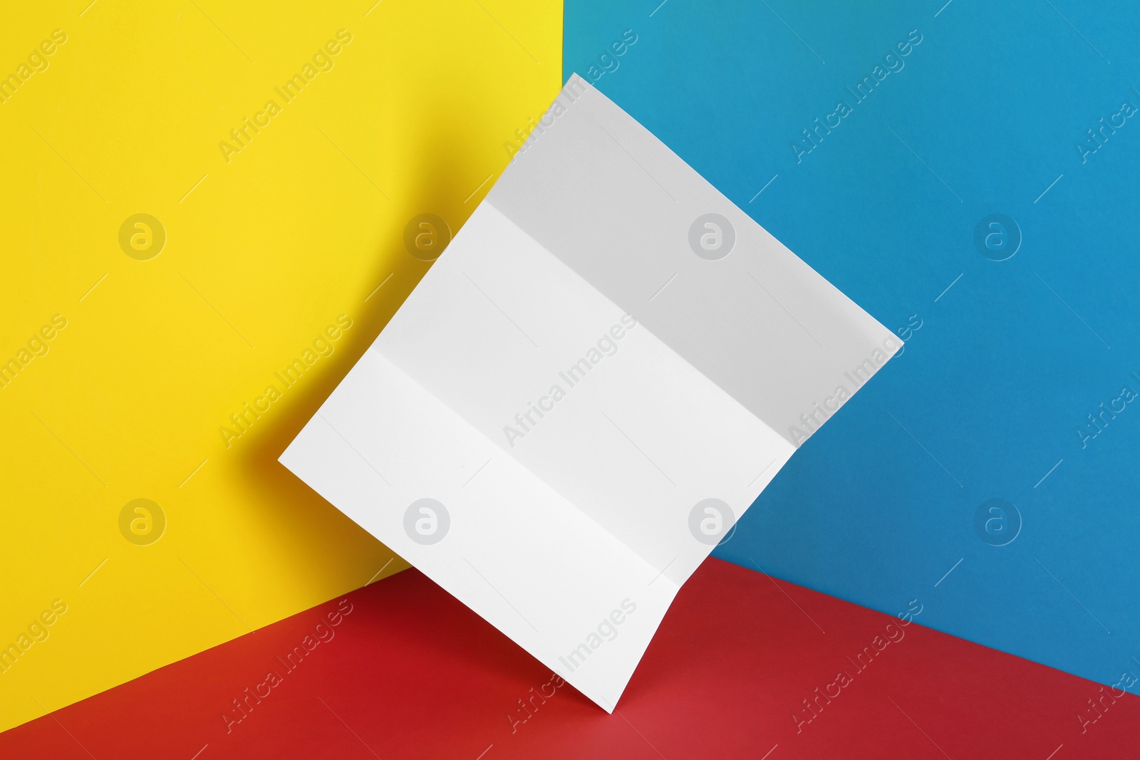 Photo of Empty flyer on color background. Mockup for design