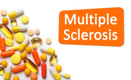 Image of Multiple sclerosis treatment. Many different pills on white background, top view