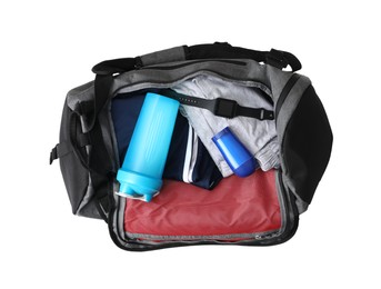 Sports bag with gym stuff isolated on white, top view