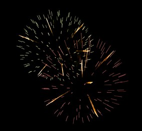 Image of Beautiful bright fireworks lighting up night sky