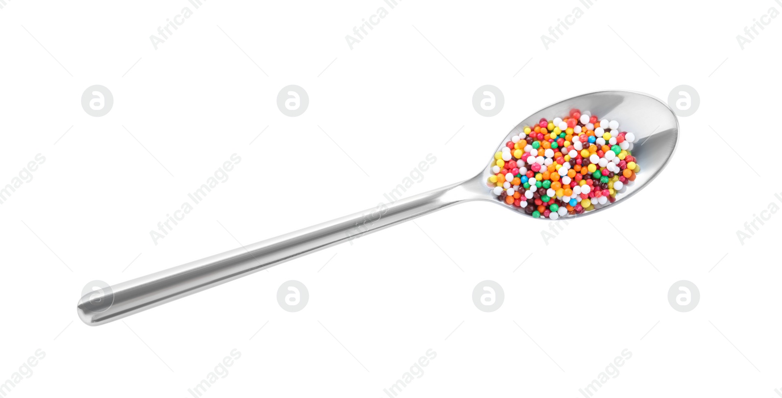 Photo of Colorful sprinkles in spoon on white background, top view. Confectionery decor