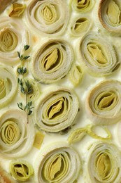 Tasty leek pie as background, top view