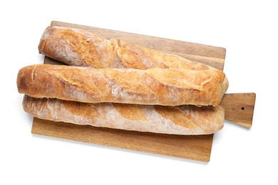 Photo of Crispy French baguettes on white background, top view. Fresh bread