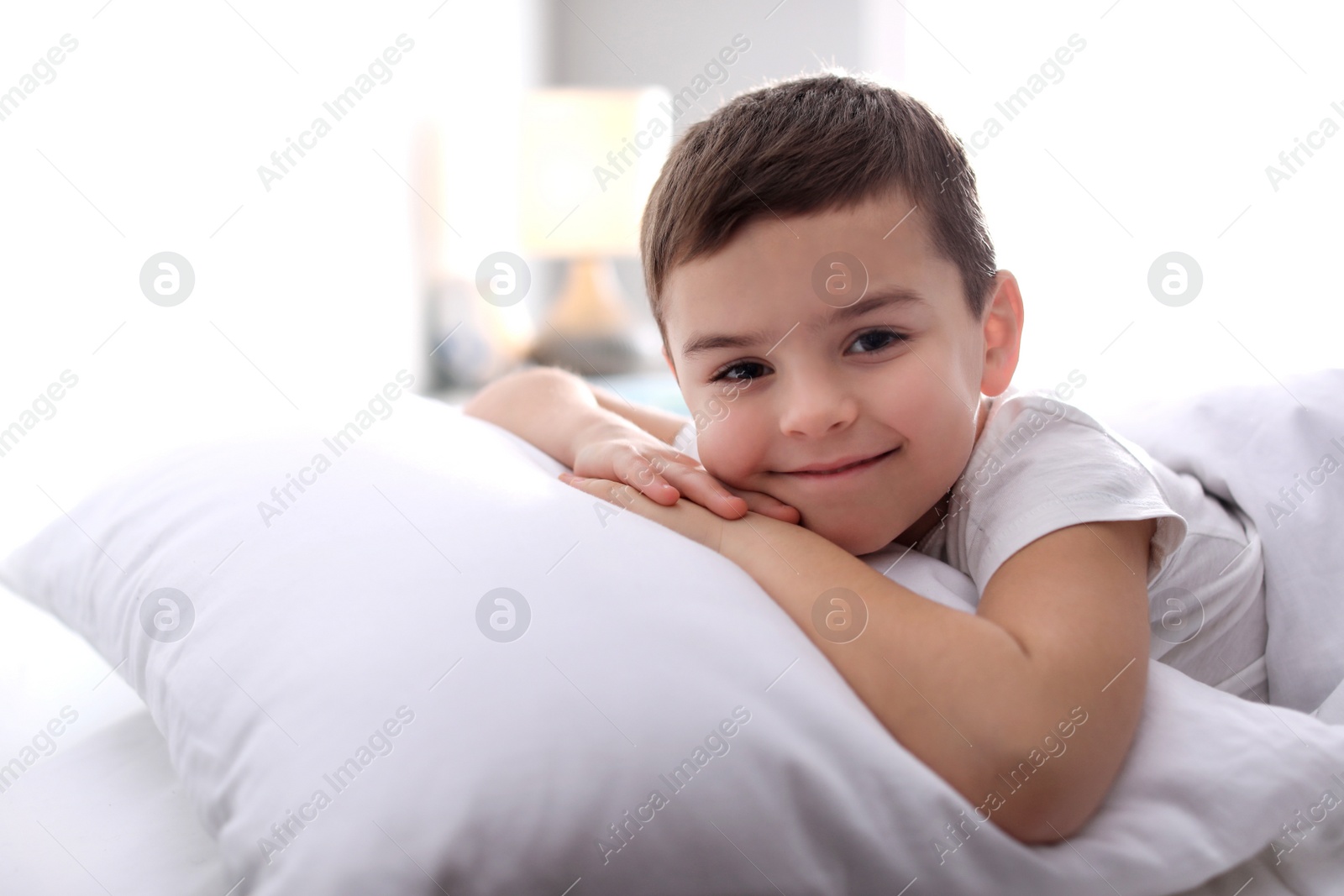 Photo of Happy cute little boy at home. Bedtime