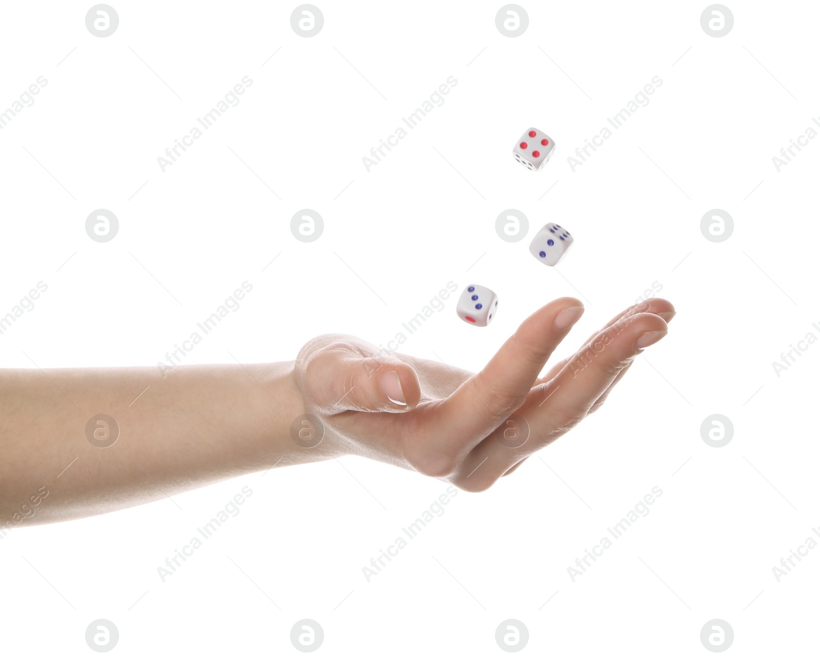 Photo of Woman throwing game dices on white background, closeup