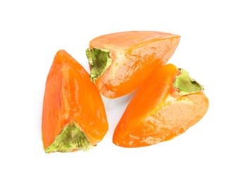 Photo of Slices of delicious persimmon isolated on white, top view