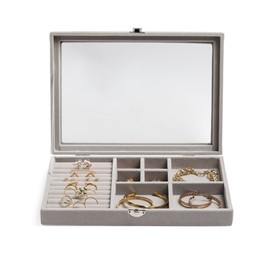 Jewelry box with many different golden accessories isolated on white