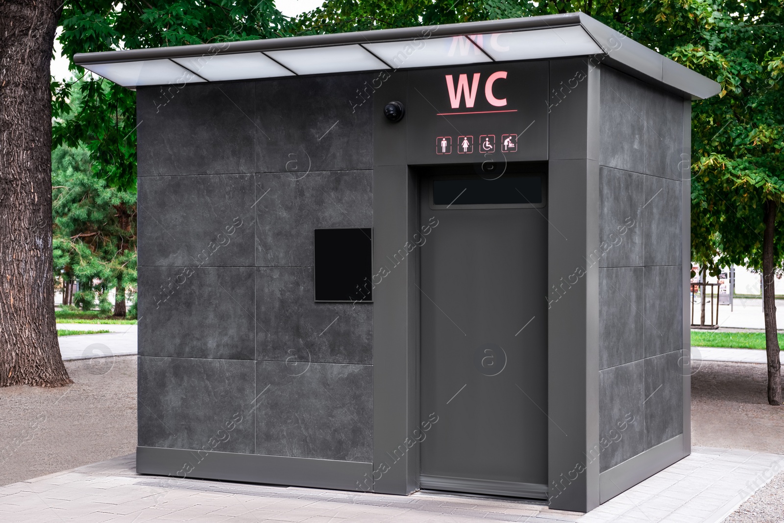 Photo of Modern outdoor public toilet in city park