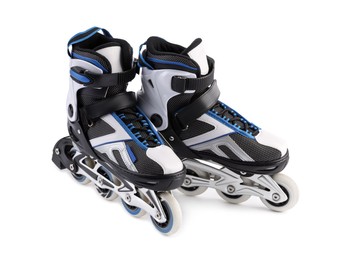 Photo of Pair of roller skates isolated on white. Sports equipment