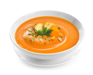 Photo of Dish with pumpkin cream soup on white background. Healthy food