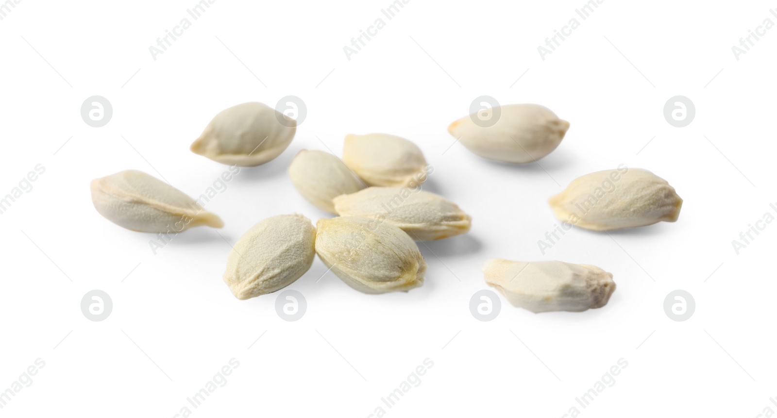 Photo of Many seeds of tangerine isolated on white