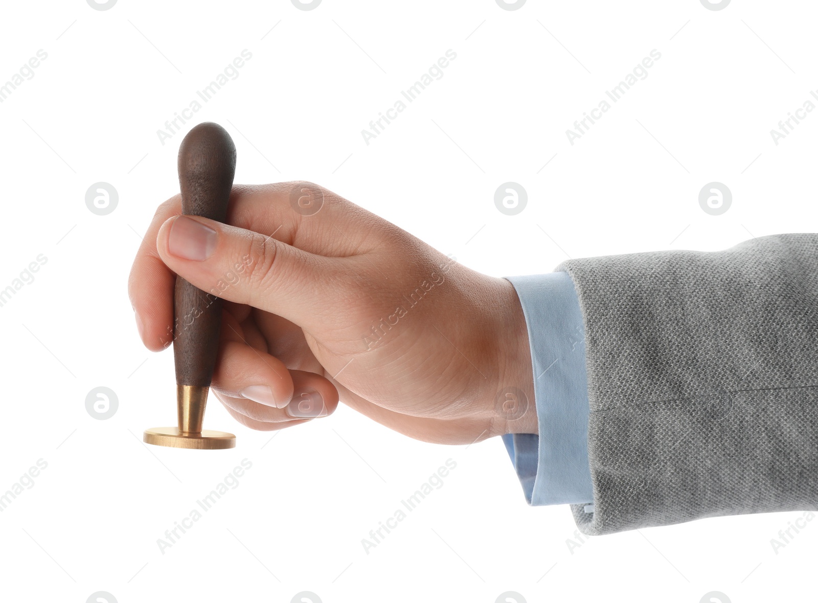 Photo of Man holding wooden stamp on white background, closeup