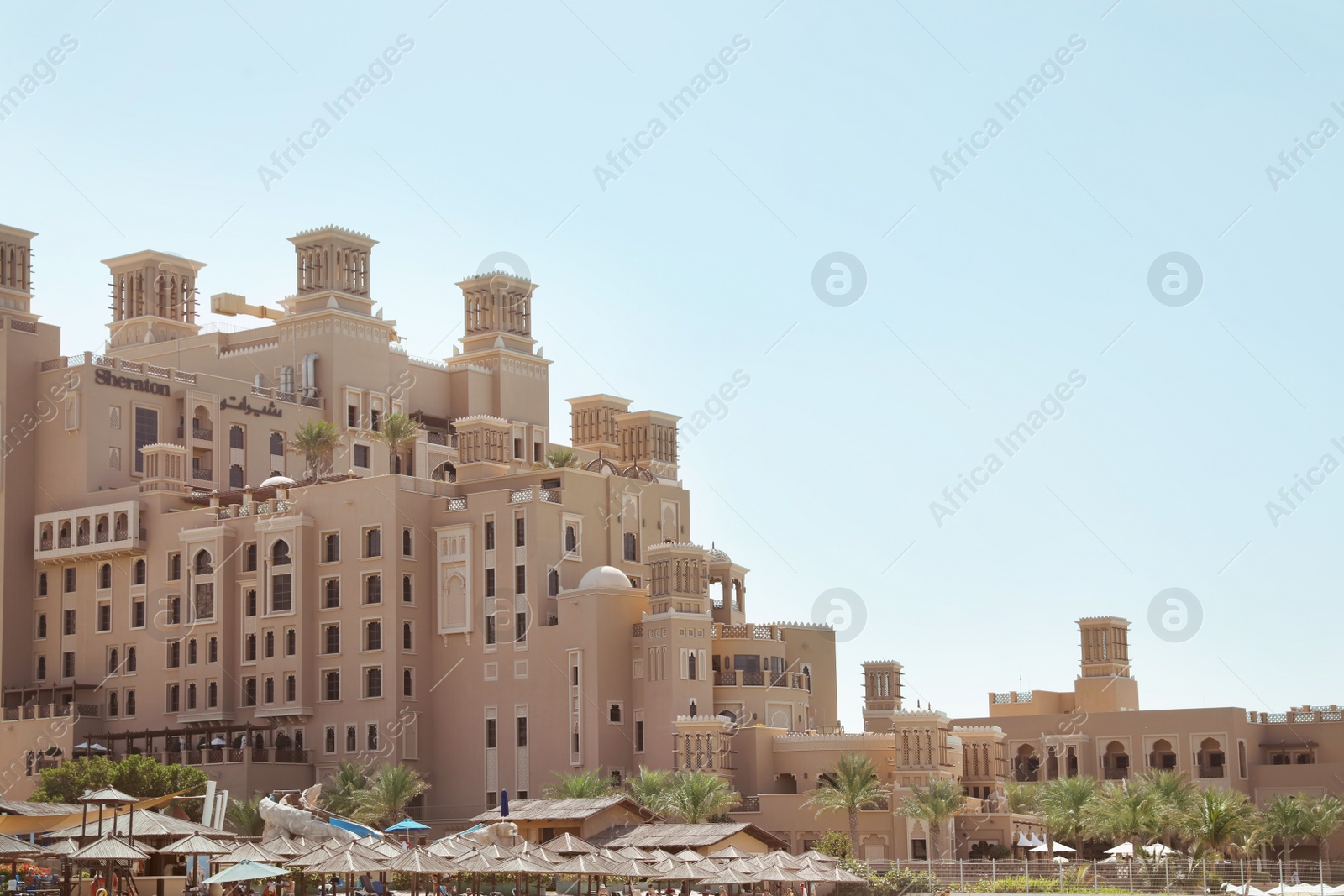 Photo of SHARJAH, UNITED ARAB EMIRATES - NOVEMBER 04, 2018: Beautiful landscape with Sheraton resort on sunny day