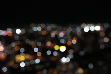 Photo of Blurred view of cityscape at night. Bokeh effect