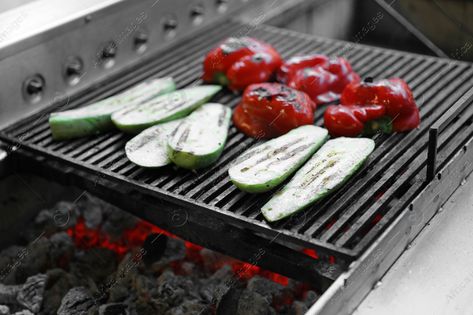 Photo of Grill with cut vegetables. Delicious street food