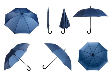 Image of Set with stylish blue umbrellas on white background