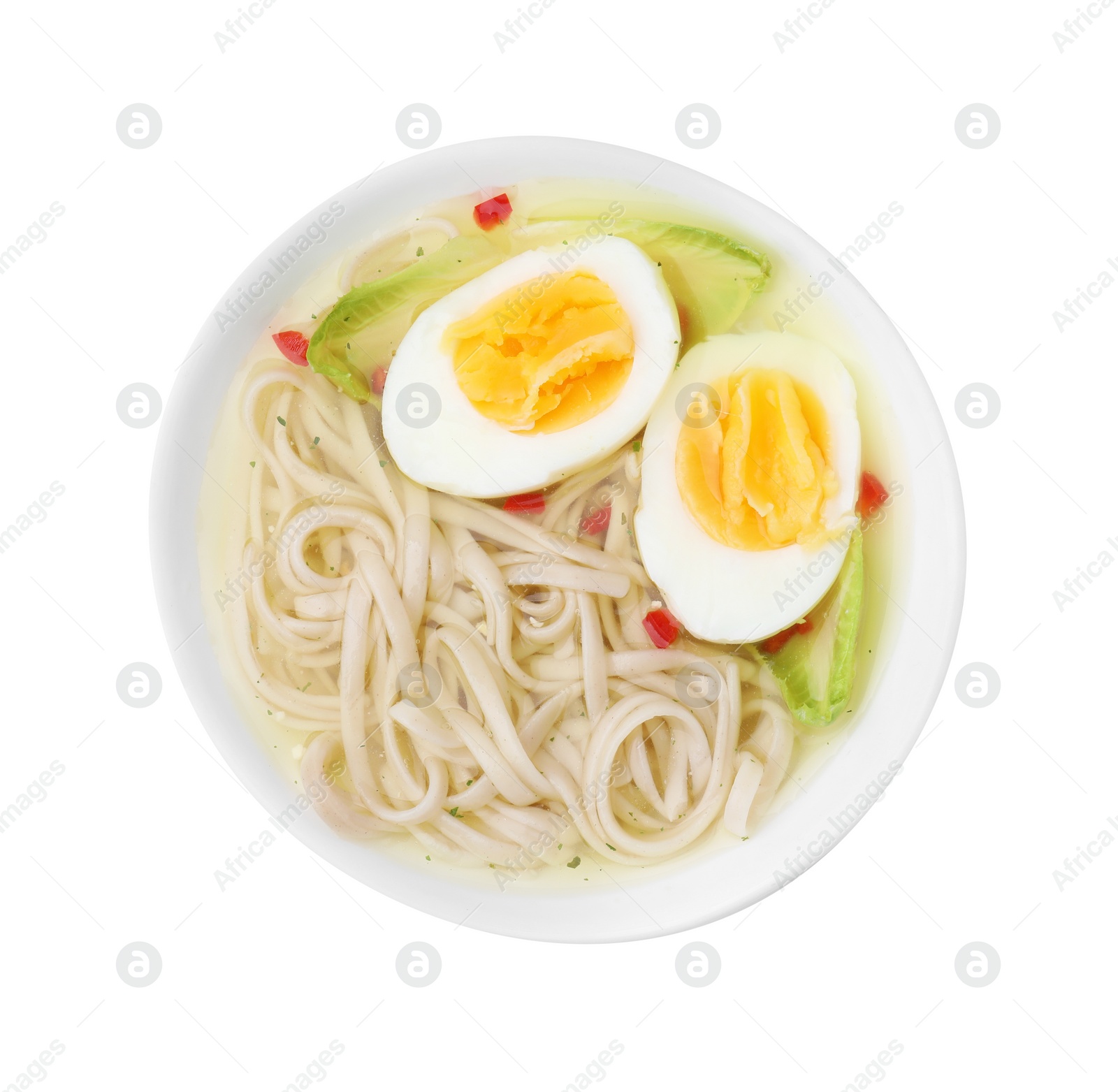 Photo of Bowl of delicious rice noodle soup with celery and egg isolated on white, top view