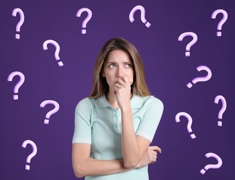 Image of Amnesia. Confused young woman and question marks on purple background