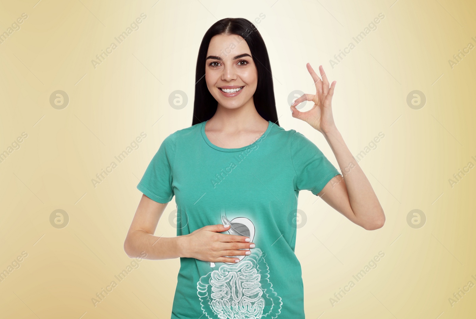 Image of Happy woman with healthy digestive system on light yellow background. Illustration of gastrointestinal tract