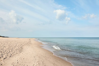 Photo of Beautiful view of sea shore and blue sky on sunny day