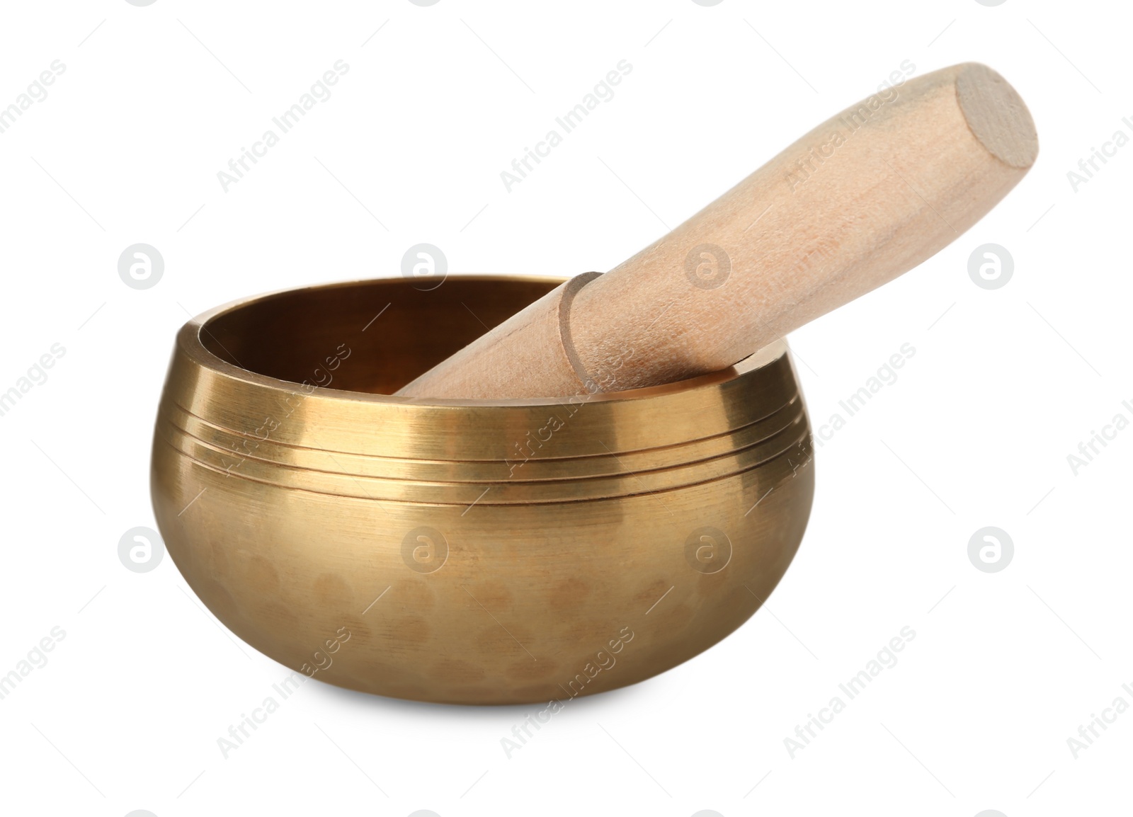 Photo of Golden singing bowl with mallet on white background. Sound healing