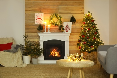 Fireplace in beautiful living room decorated for Christmas
