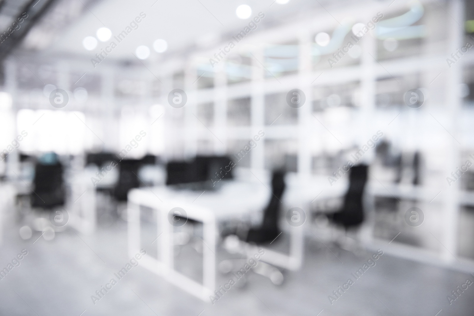 Image of Office interior. Blurred view of comfortable workspace