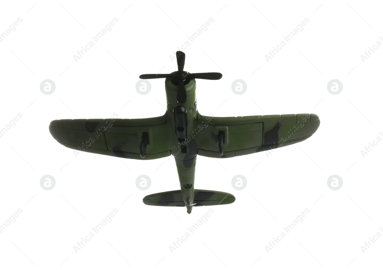 Photo of Vintage toy military airplane on white background