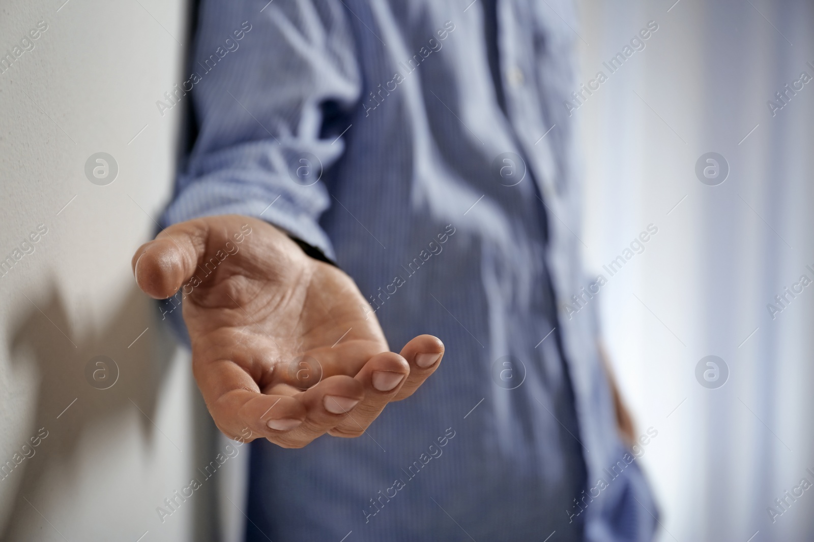 Photo of Man giving hand to somebody, closeup. Help and support concept