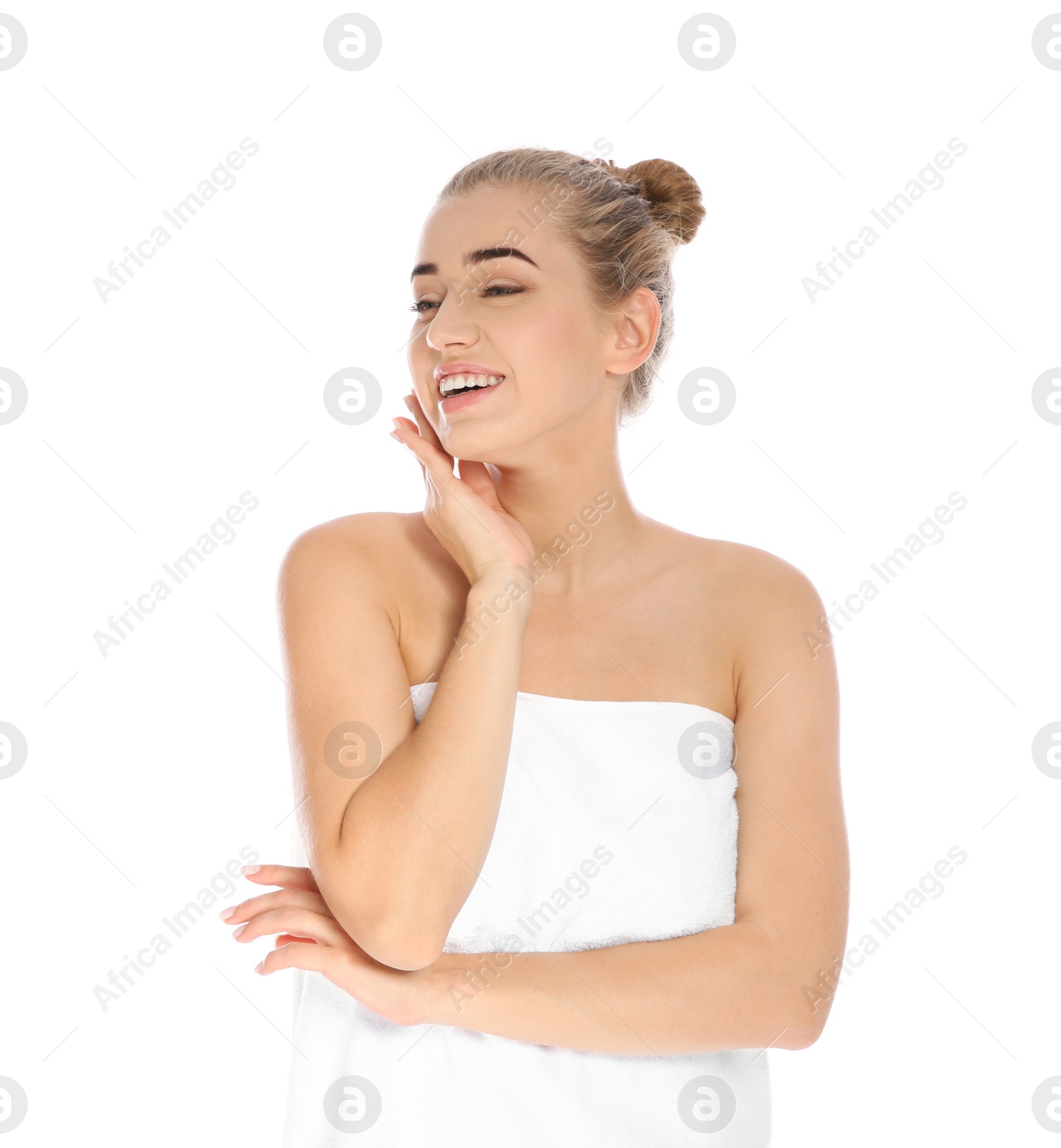 Photo of Portrait of young pretty woman with towel on white background