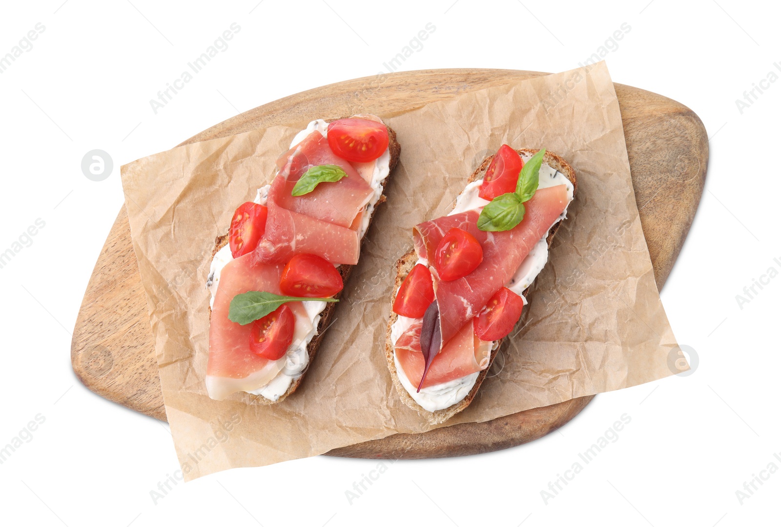 Photo of Tasty bruschettas with prosciutto, tomatoes and cheese on white background, top view