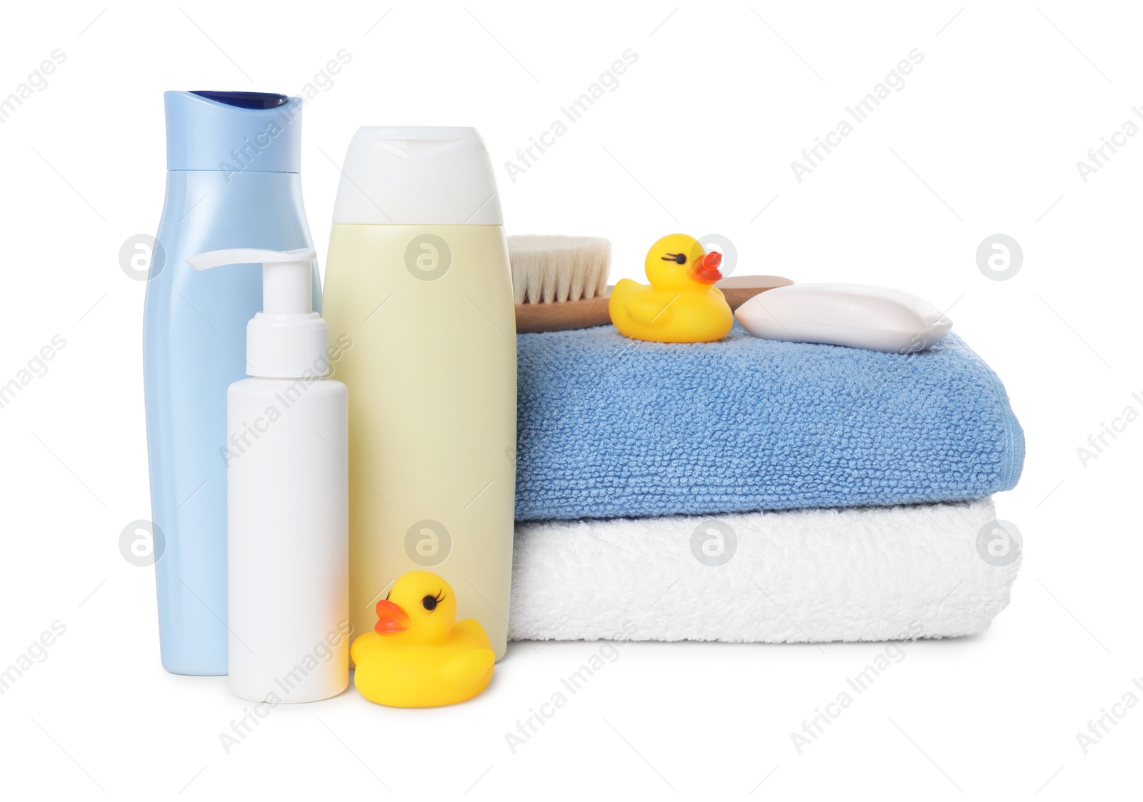 Photo of Baby cosmetic products, bath ducks, brush and towels isolated on white
