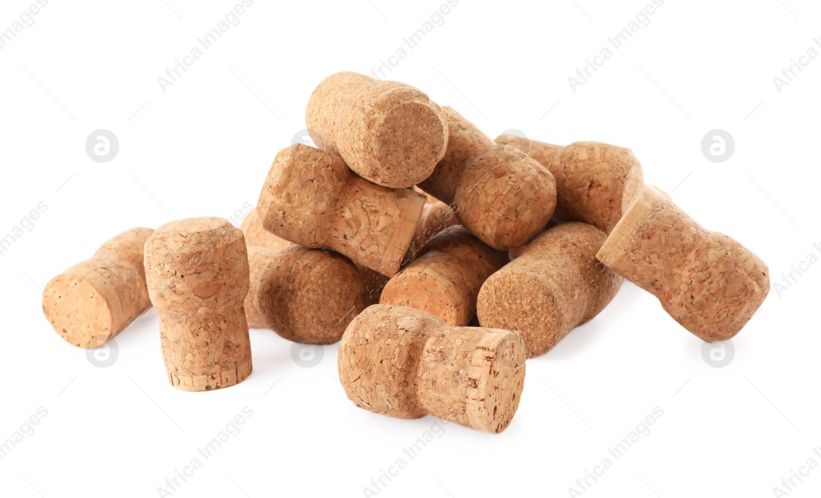 Photo of Heap of sparkling wine corks on white background