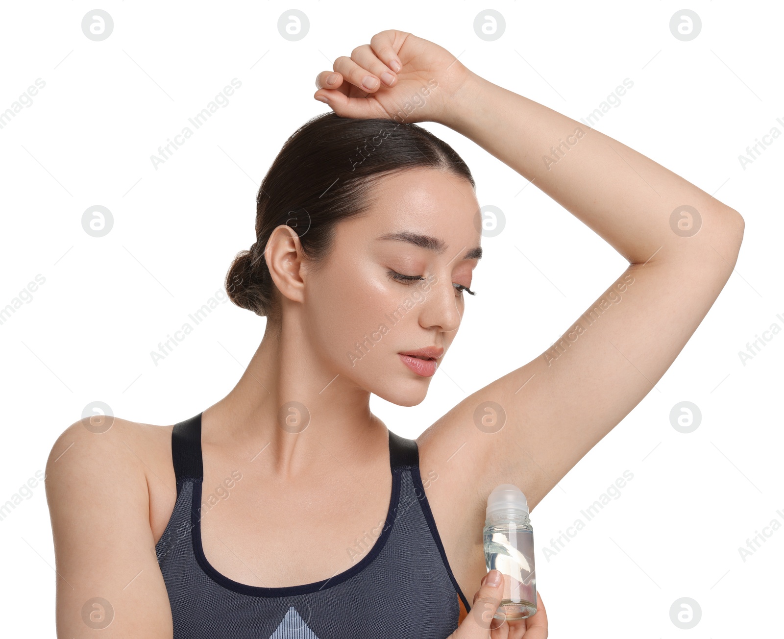 Photo of Beautiful woman applying deodorant on white background