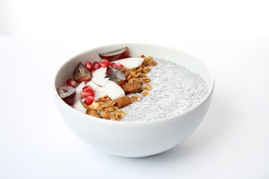Photo of Bowl of tasty chia seed pudding on white background