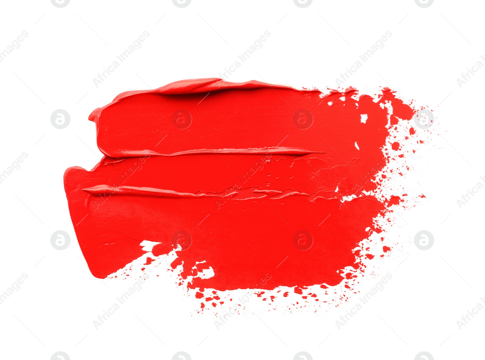 Photo of Red oil paint stroke on white background, top view