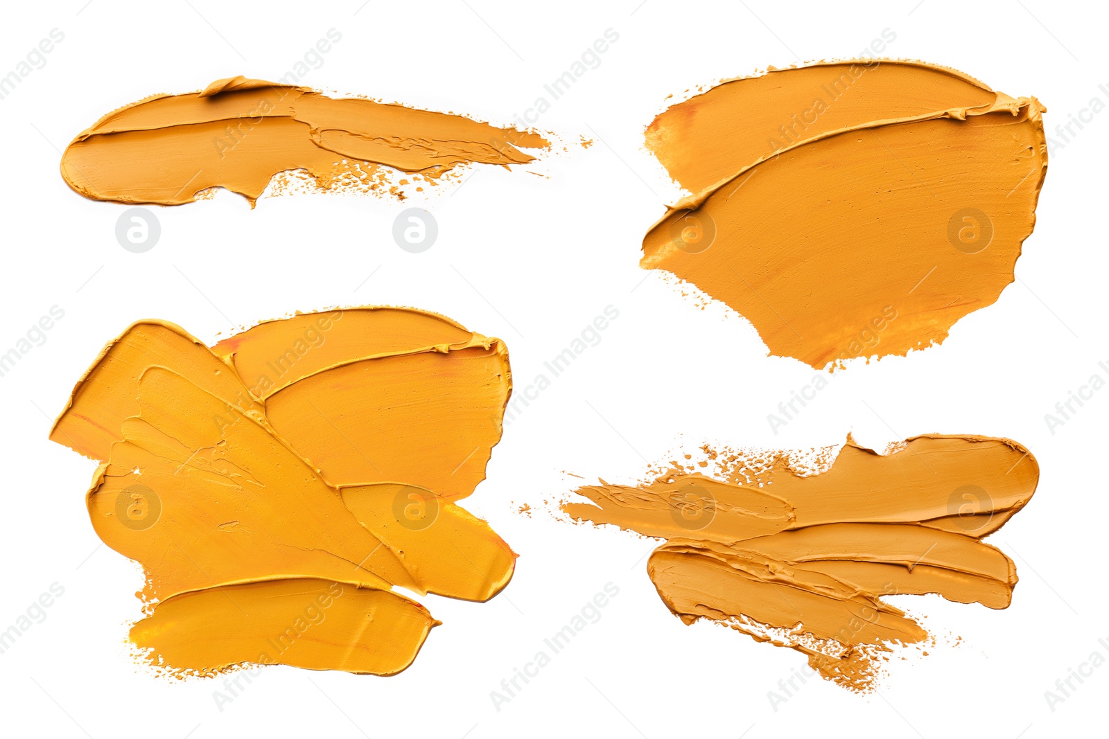 Image of Orange oil paint strokes isolated on white, top view