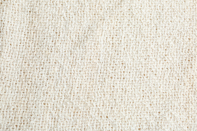 Photo of Texture of beautiful light fabric as background, closeup