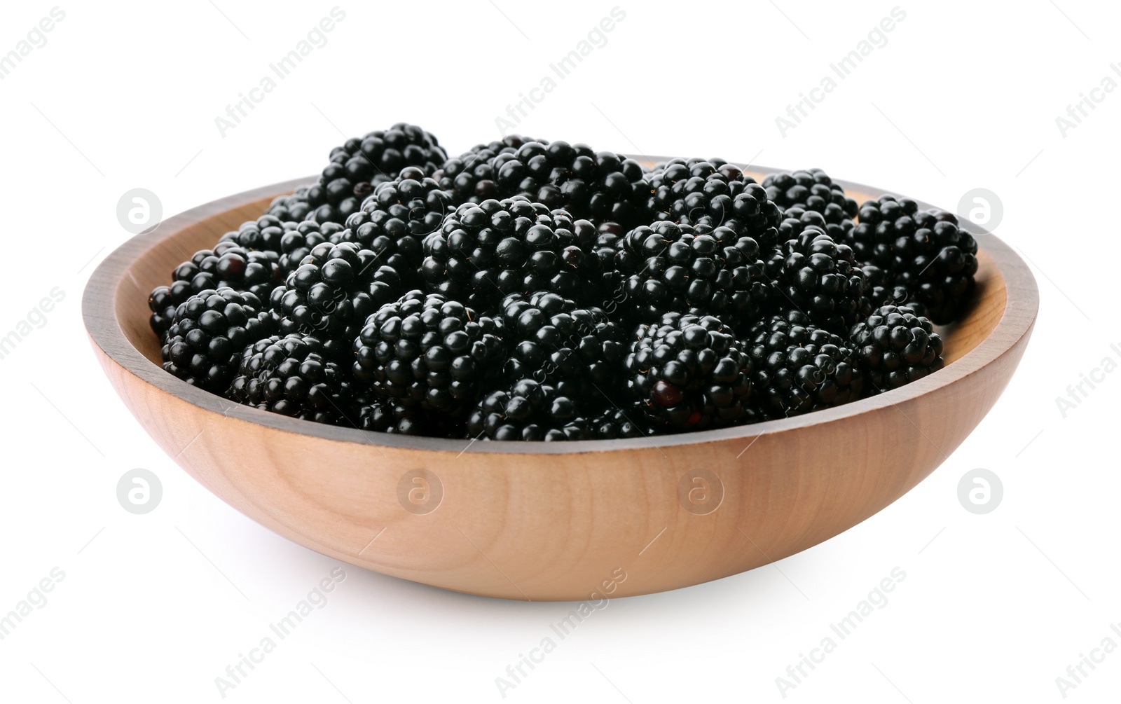 Photo of Wooden bowl of tasty ripe blackberries on white background