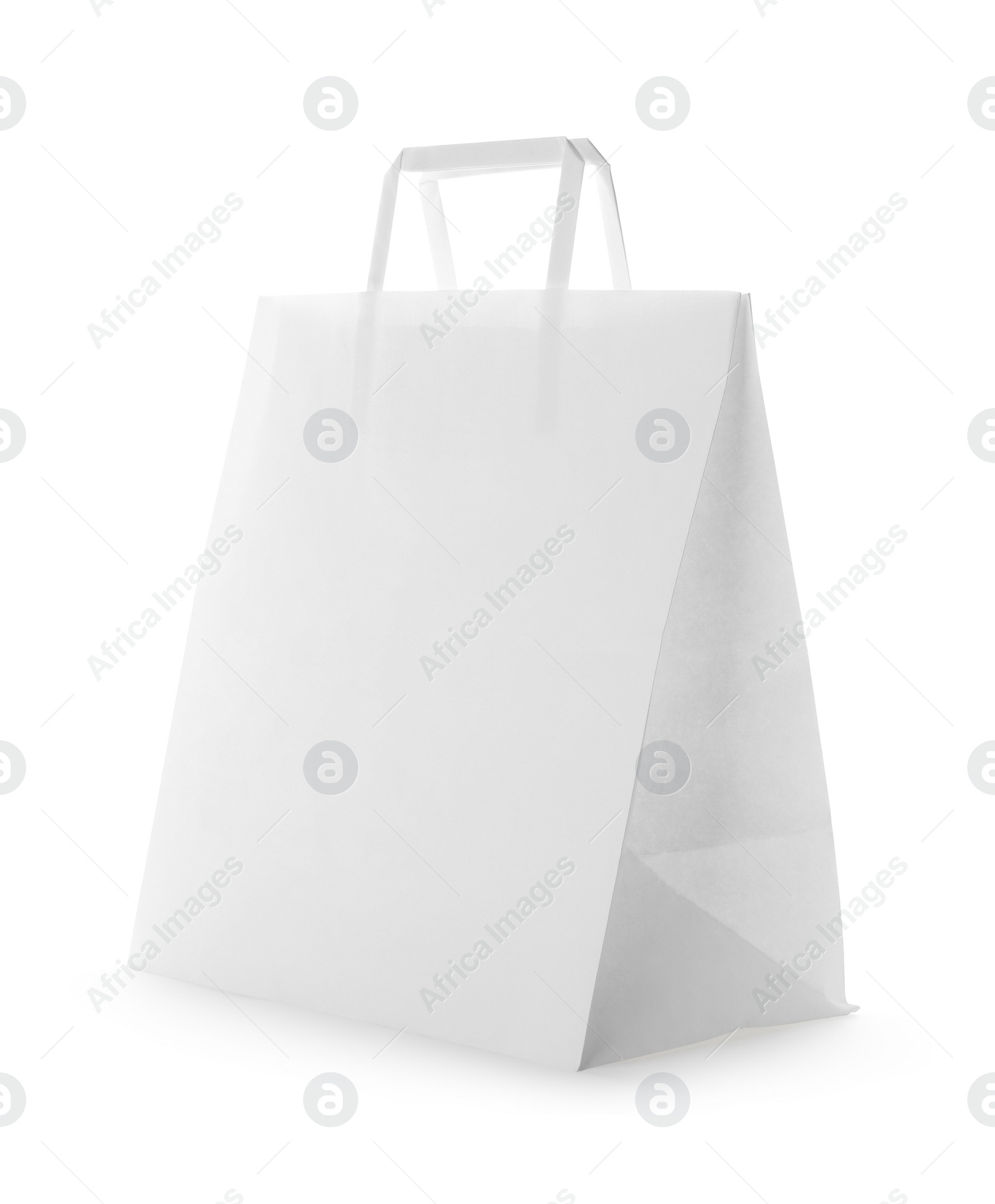 Photo of Blank paper bag on white background. Space for design