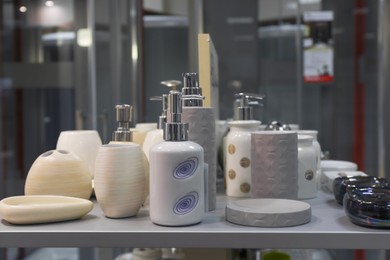 Photo of Sets of bath accessories on display in store