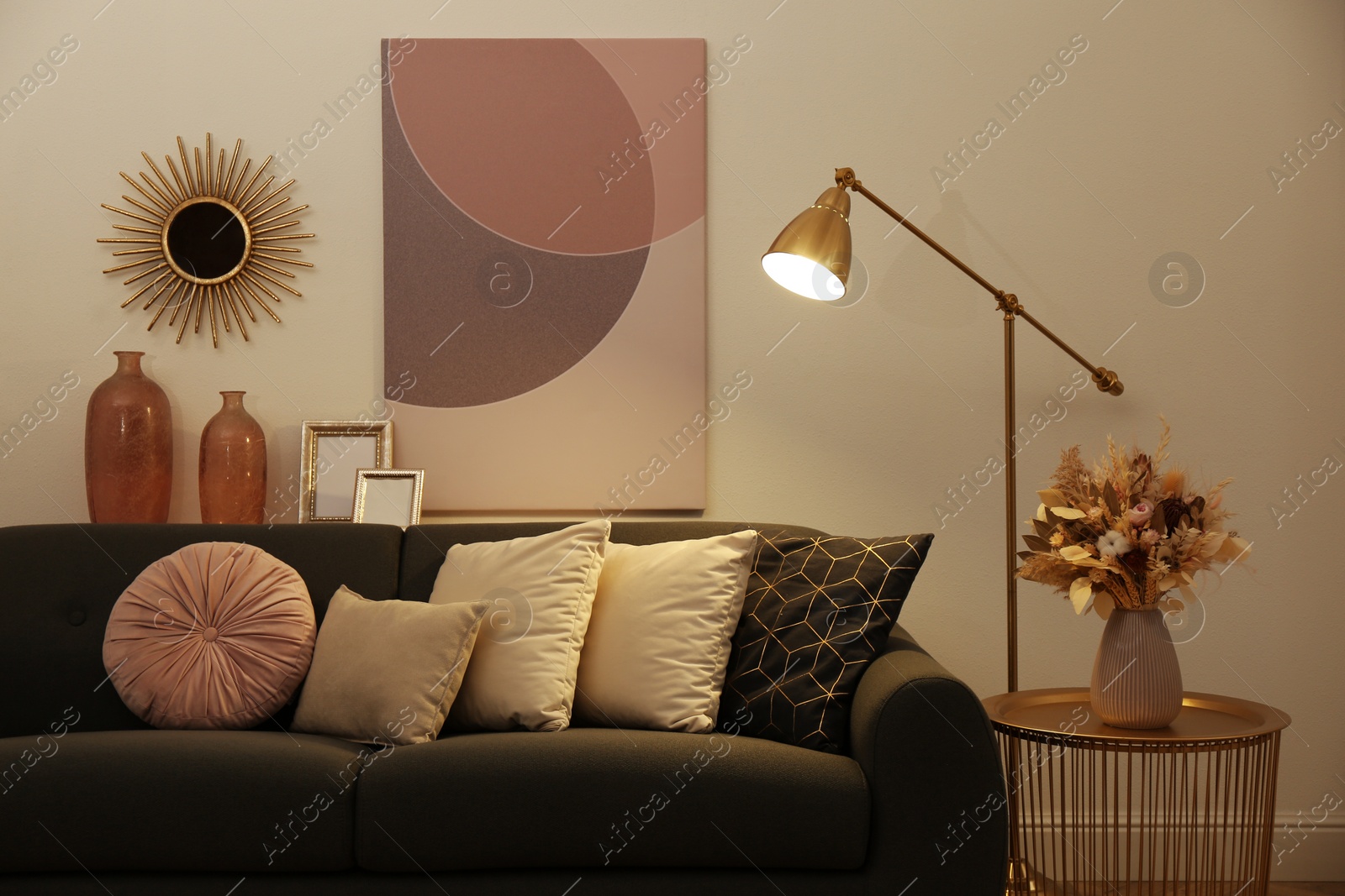 Photo of Stylish living room interior with comfortable sofa and floor lamp