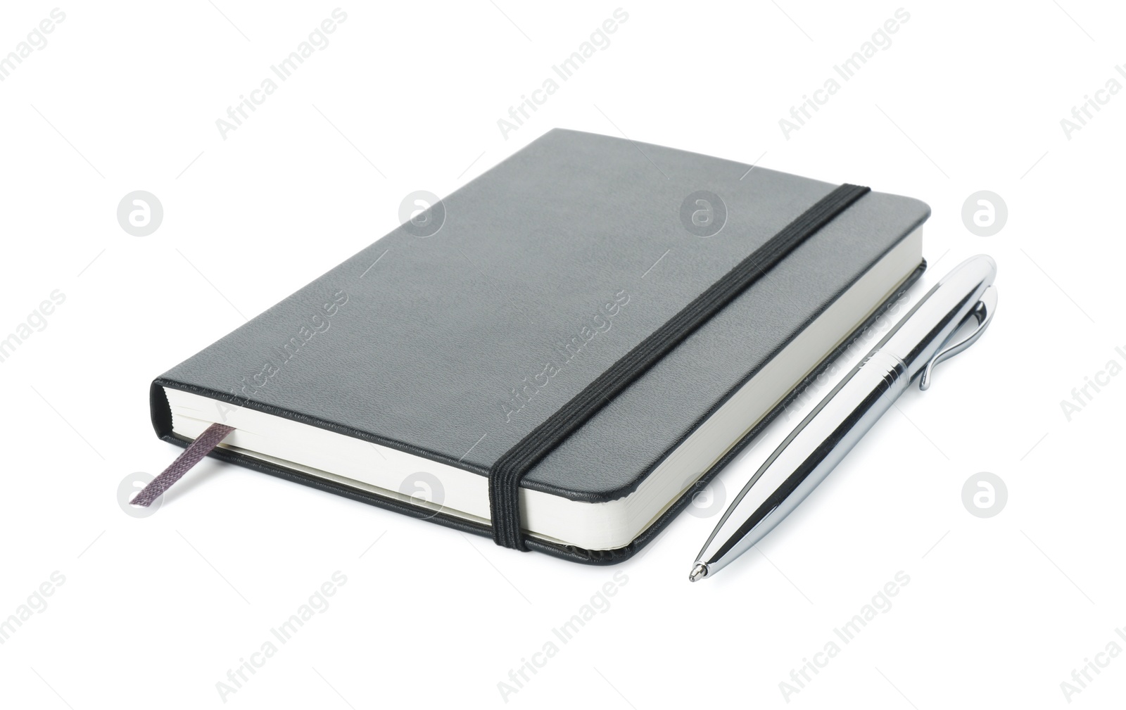 Photo of Closed black notebook with pen isolated on white