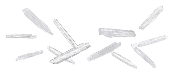 Image of Translucent menthol crystals falling on white background. Banner design