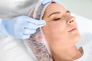 Woman undergoing face biorevitalization procedure in salon, closeup. Cosmetic treatment