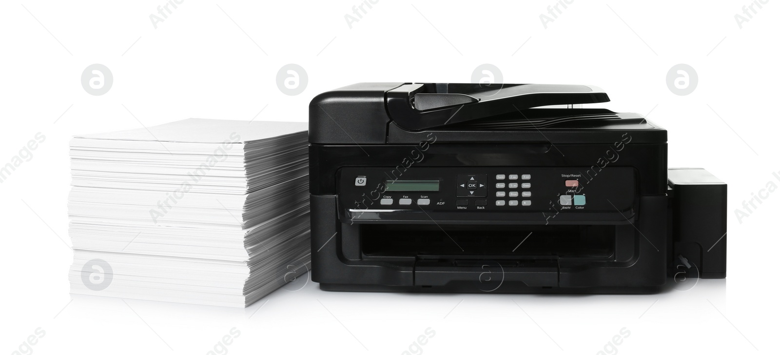 Photo of Modern printer and stack of paper on white background