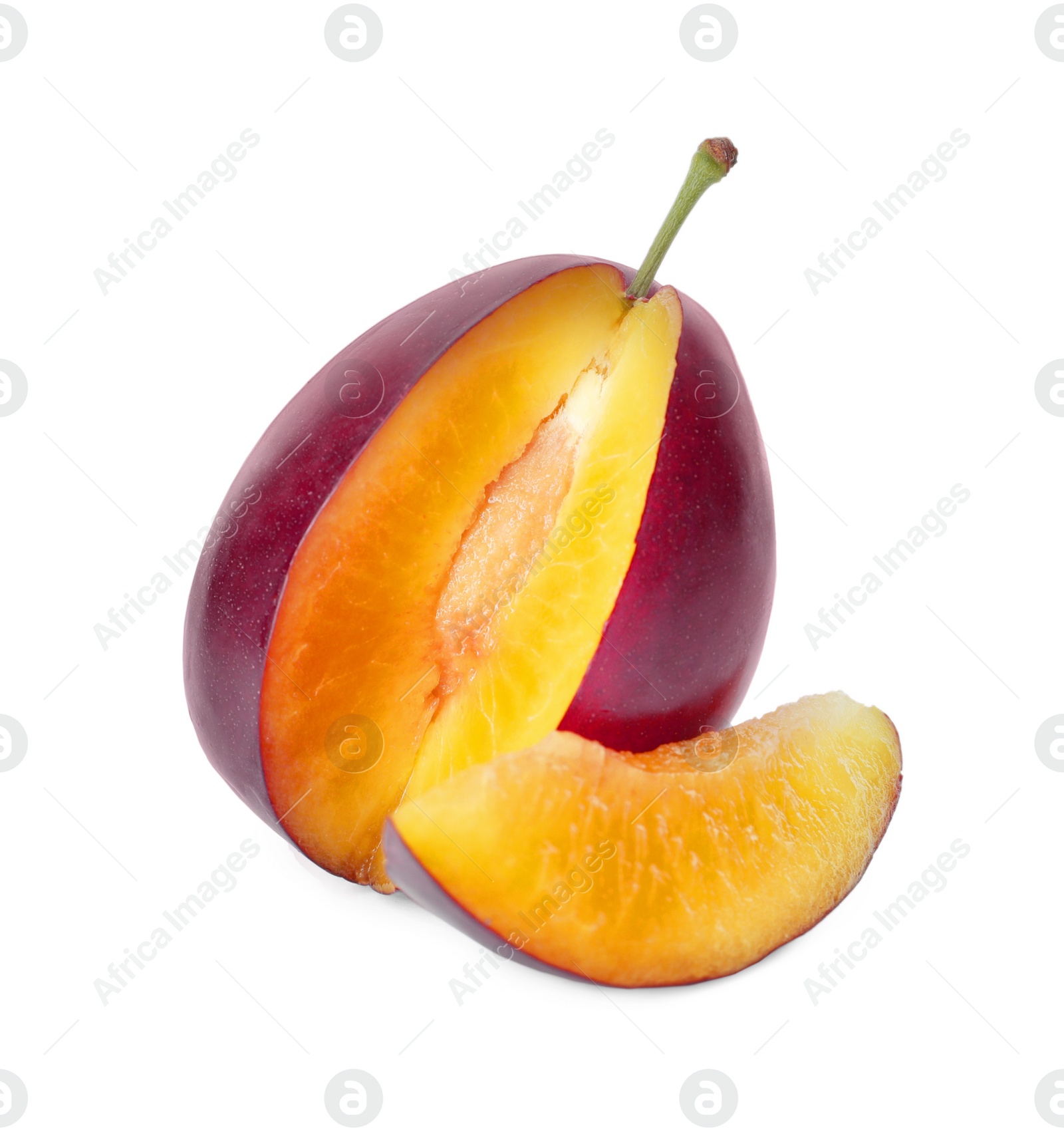 Photo of Fresh cut ripe plum on white background